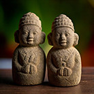 A couple of stone statues

Description automatically generated